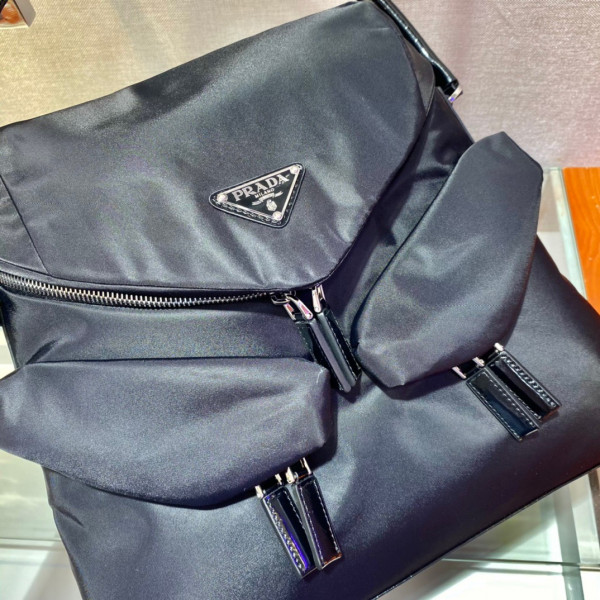 Pra*a signaux nylon and leather hobo bag