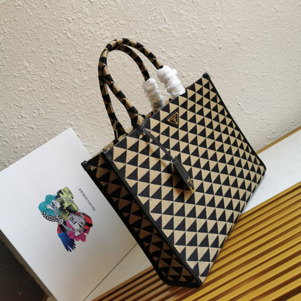 Pra*a large symbole jacquard fabric handbag