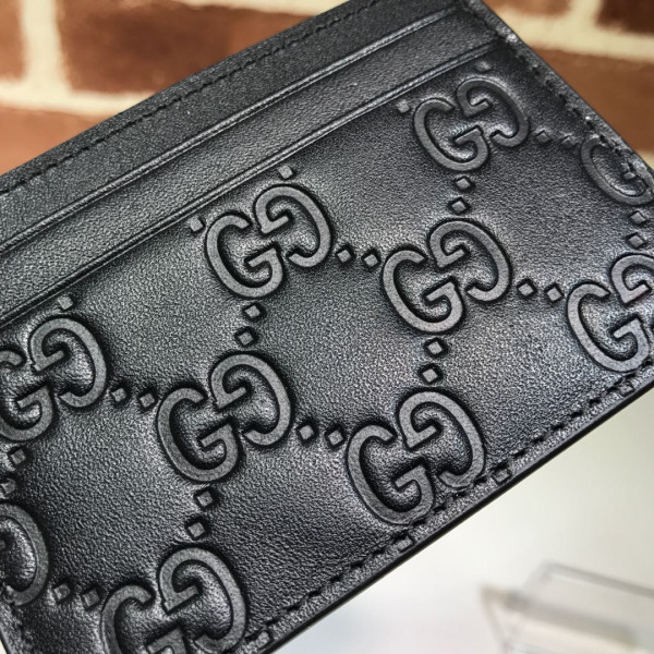 G*u*i signature card case