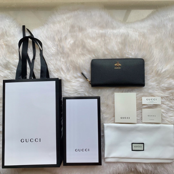 G*u*i leather zip around wallet