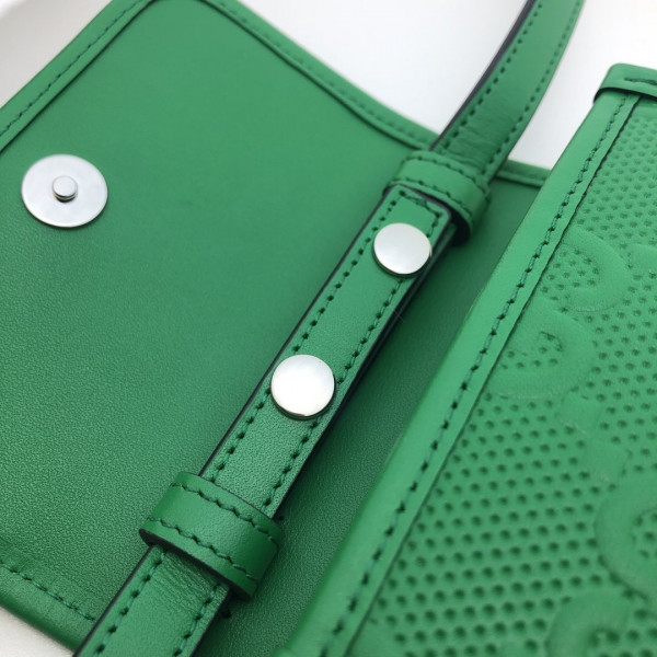 G*u*i gg embossed mini bag