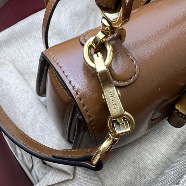 G*u*i mini top handle bag with bamboo