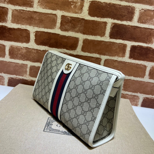 G*u*i ophidia toiletry case