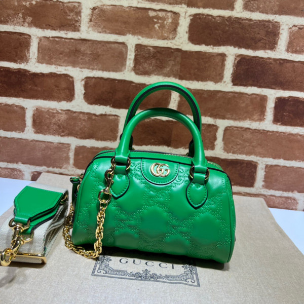 G*u*i gg matelassé leather top handle bag