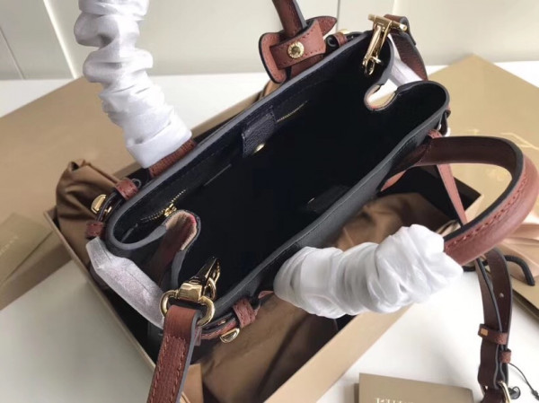 B**rry the small banner in leather and house check