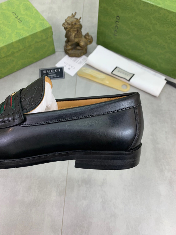 G*u*i loafers