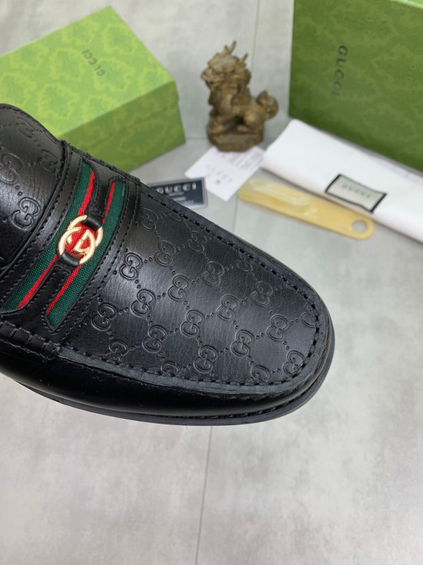 G*u*i loafers
