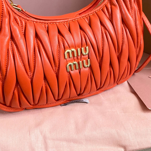 M*um*u wander matelassé nappa leather hobo bag