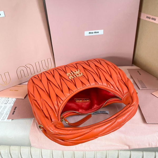 M*um*u wander matelassé nappa leather hobo bag