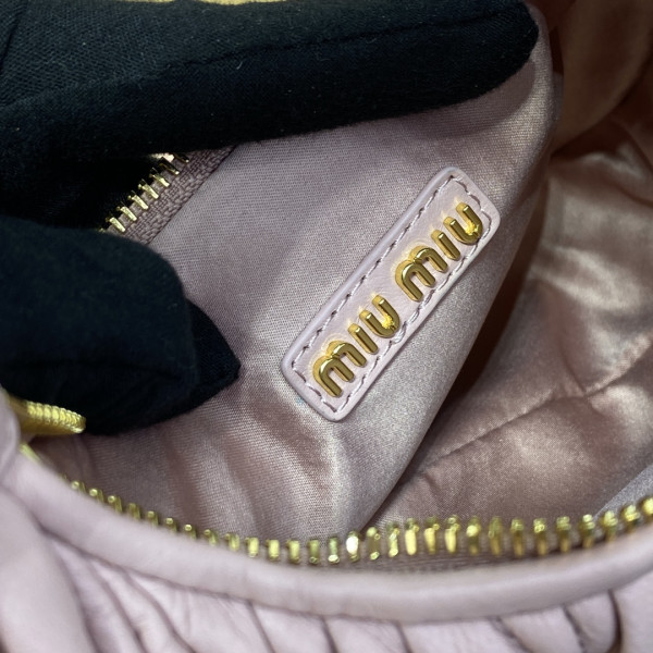 M*um*u wander matelassé nappa leather hobo bag