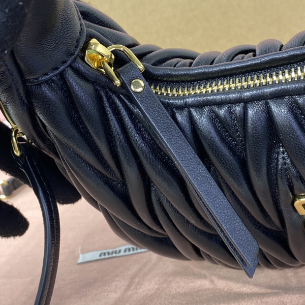 M*um*u wander matelassé nappa leather hobo bag