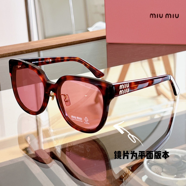 M*um*u sunglasses