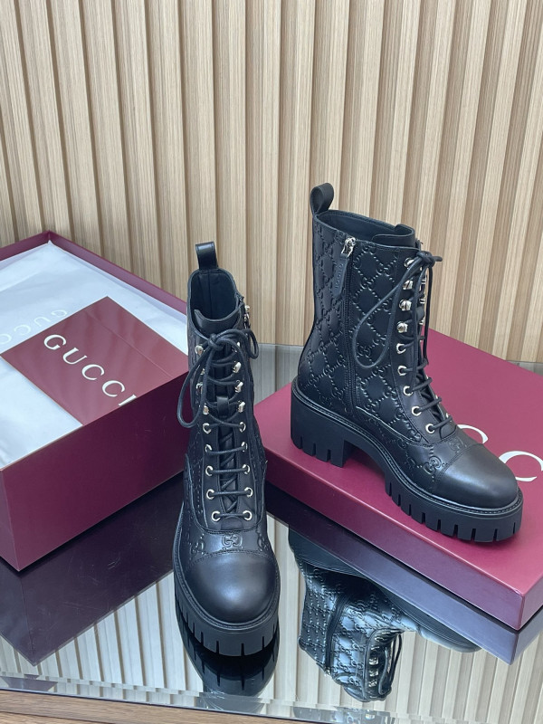 G*u*i boots