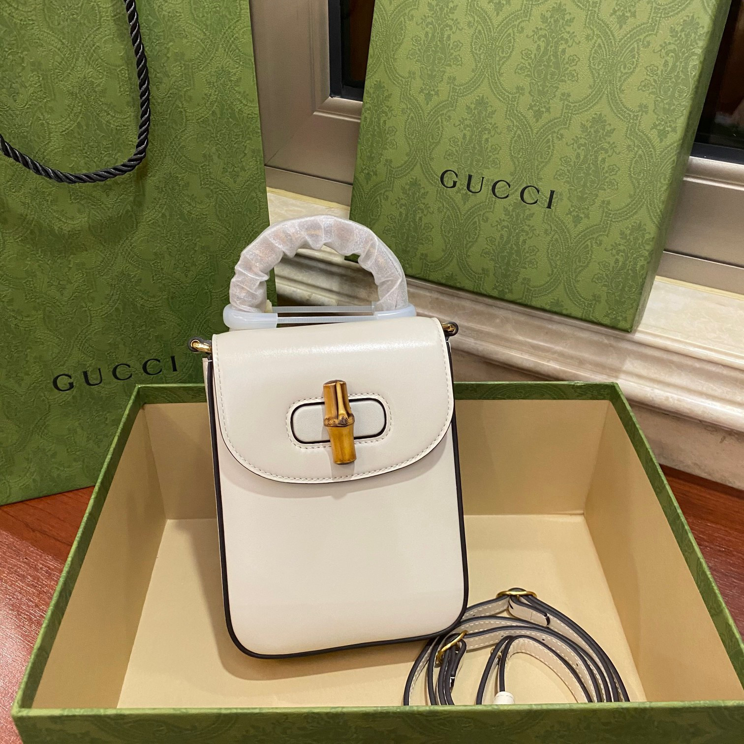 G*u*i bamboo mini handbag