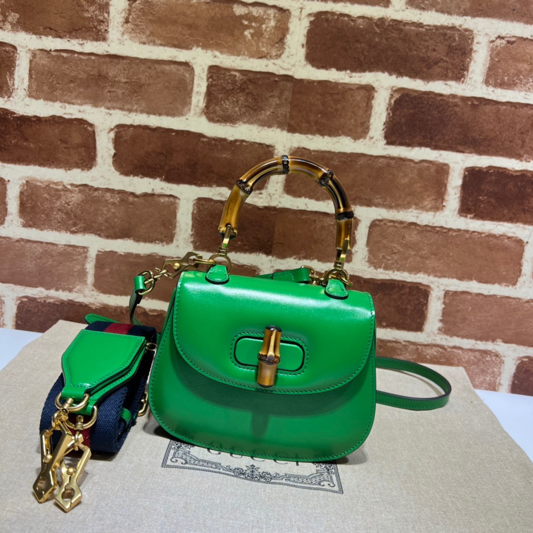 G*u*i mini top handle bag with bamboo