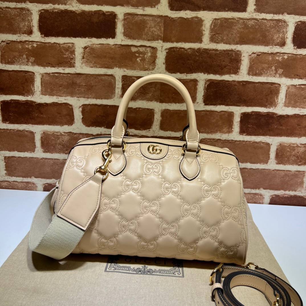 G*u*i gg matelassé leather top handle bag