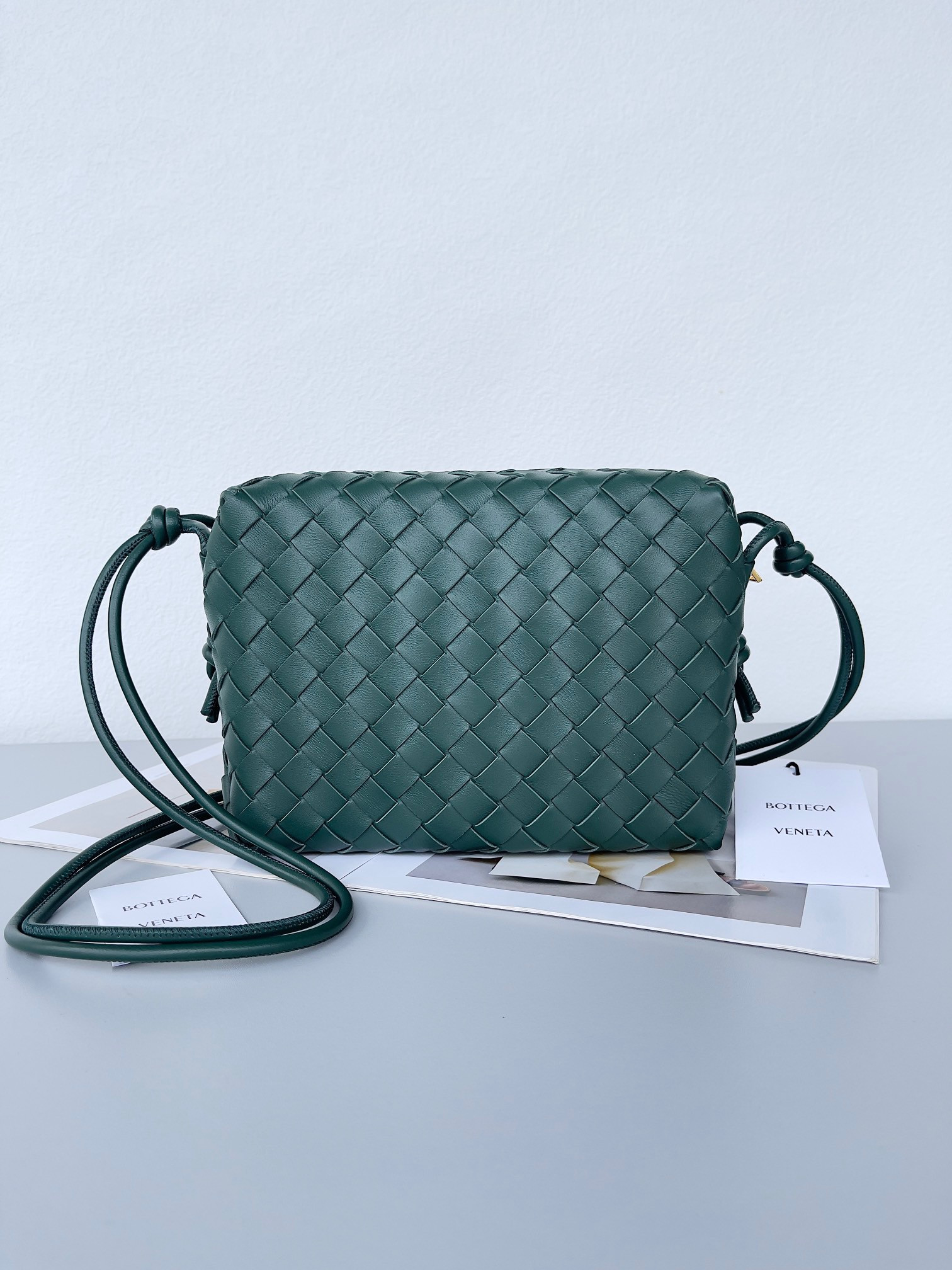 bo*te*ga Ve*ne*ta small loop camera bag