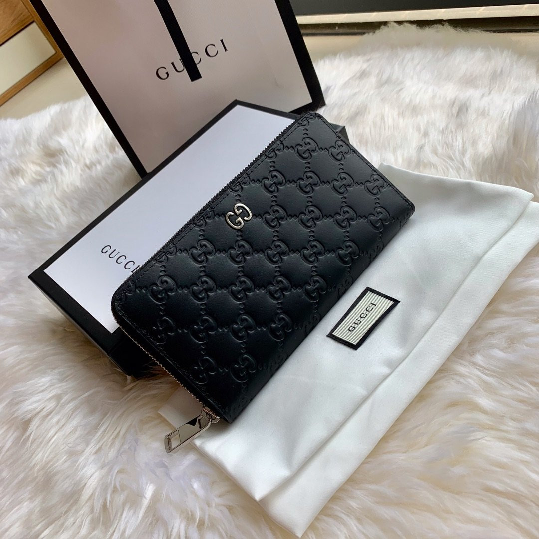 G*u*i leather zip around wallet