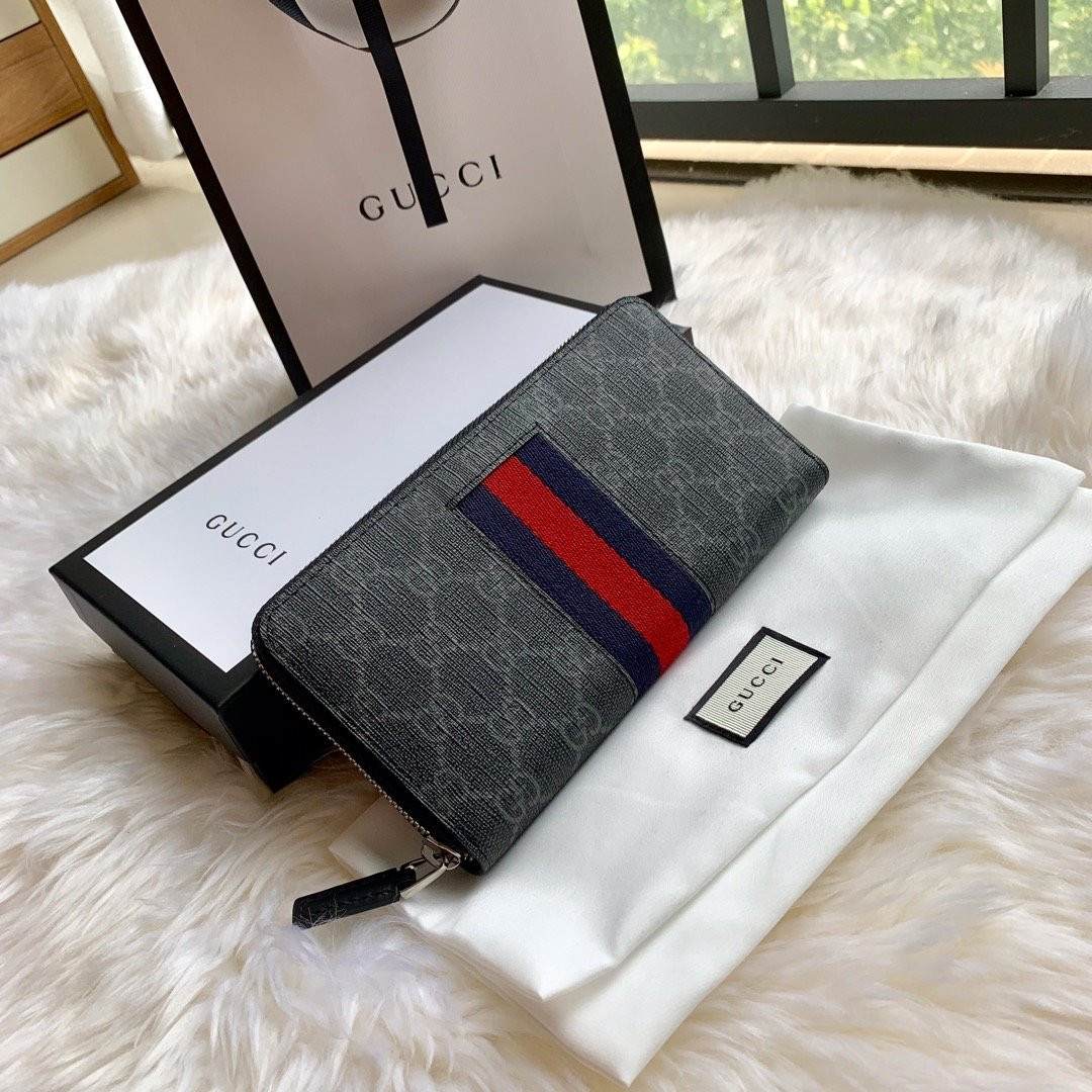 G*u*i leather zip around wallet
