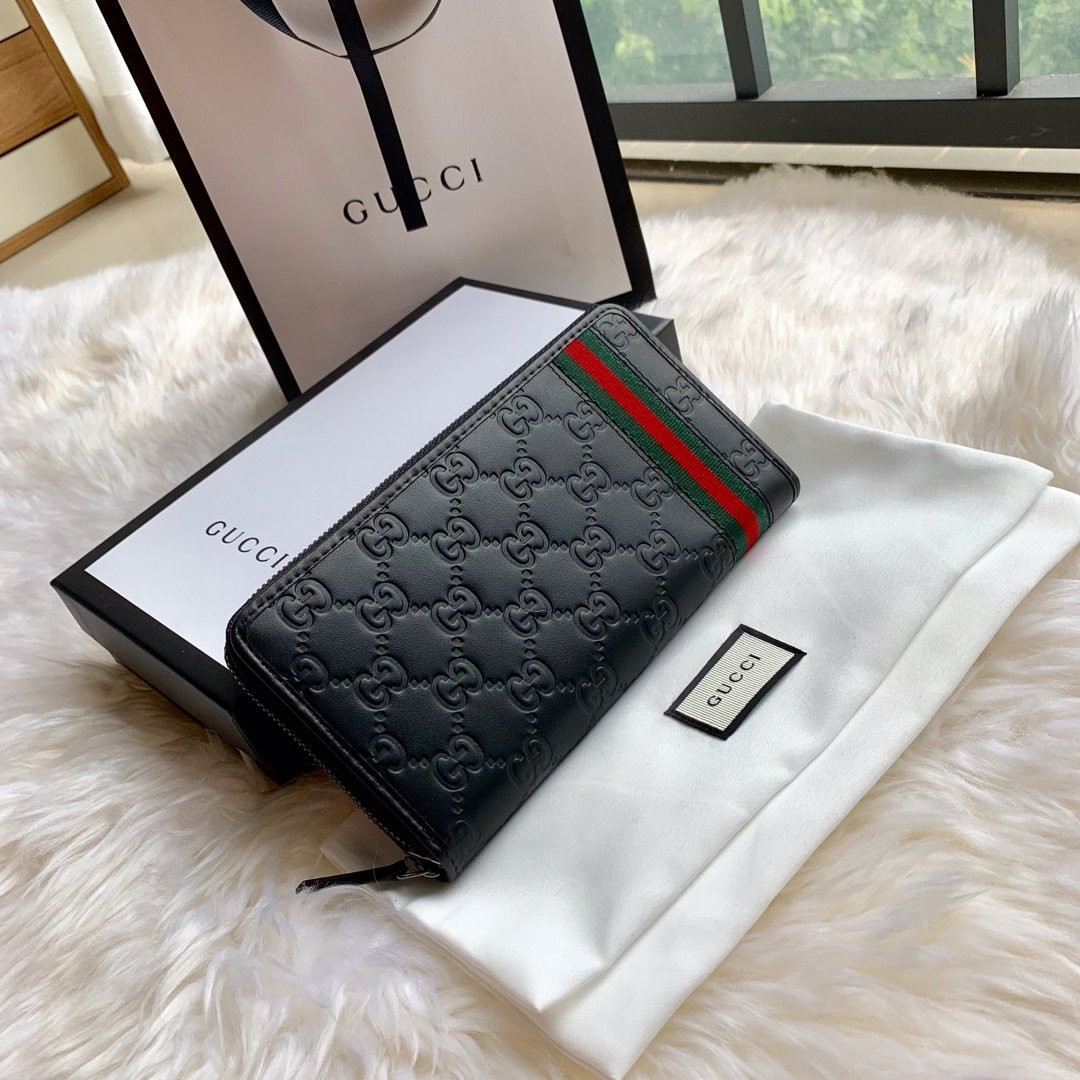 G*u*i leather zip around wallet