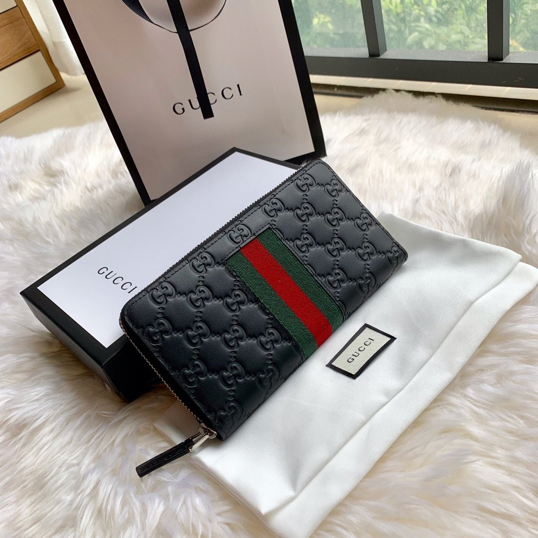 G*u*i leather zip around wallet