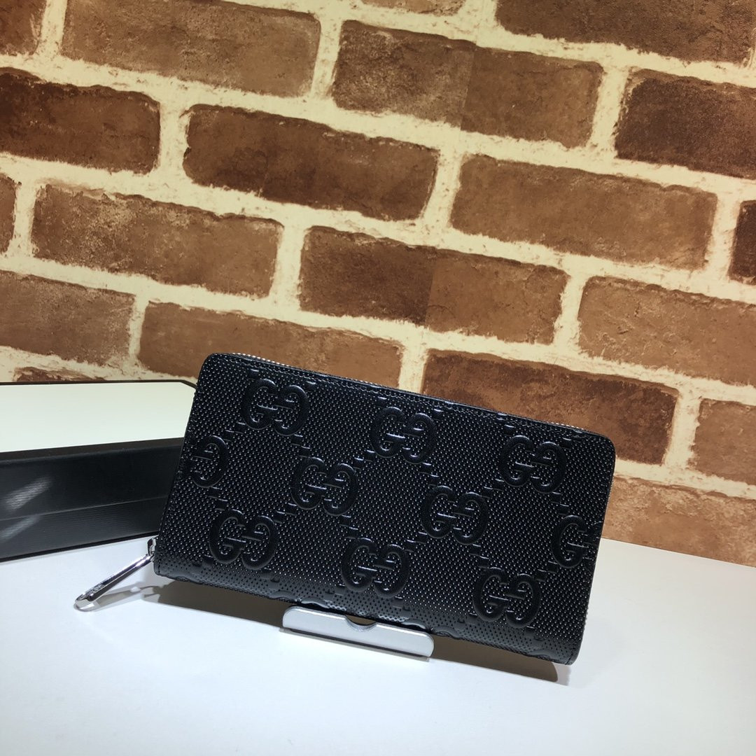 G*u*i gg embossed zippy wallet
