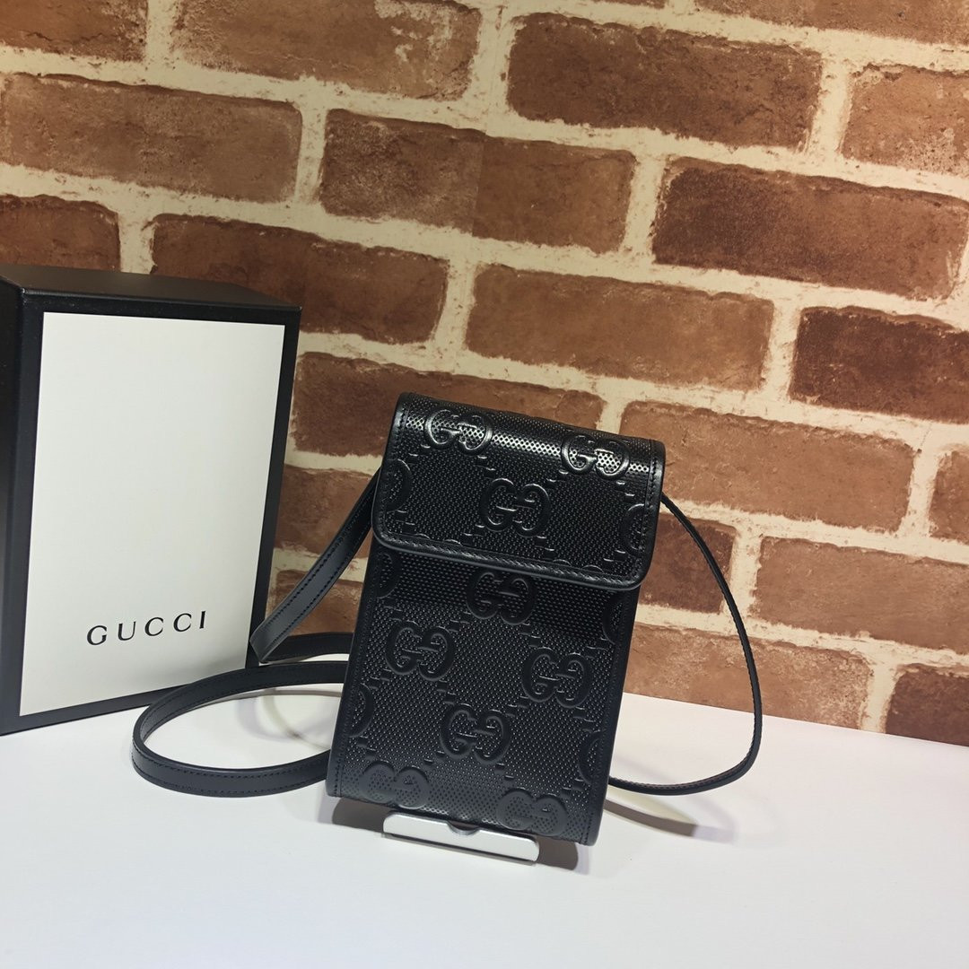G*u*i gg embossed mini bag