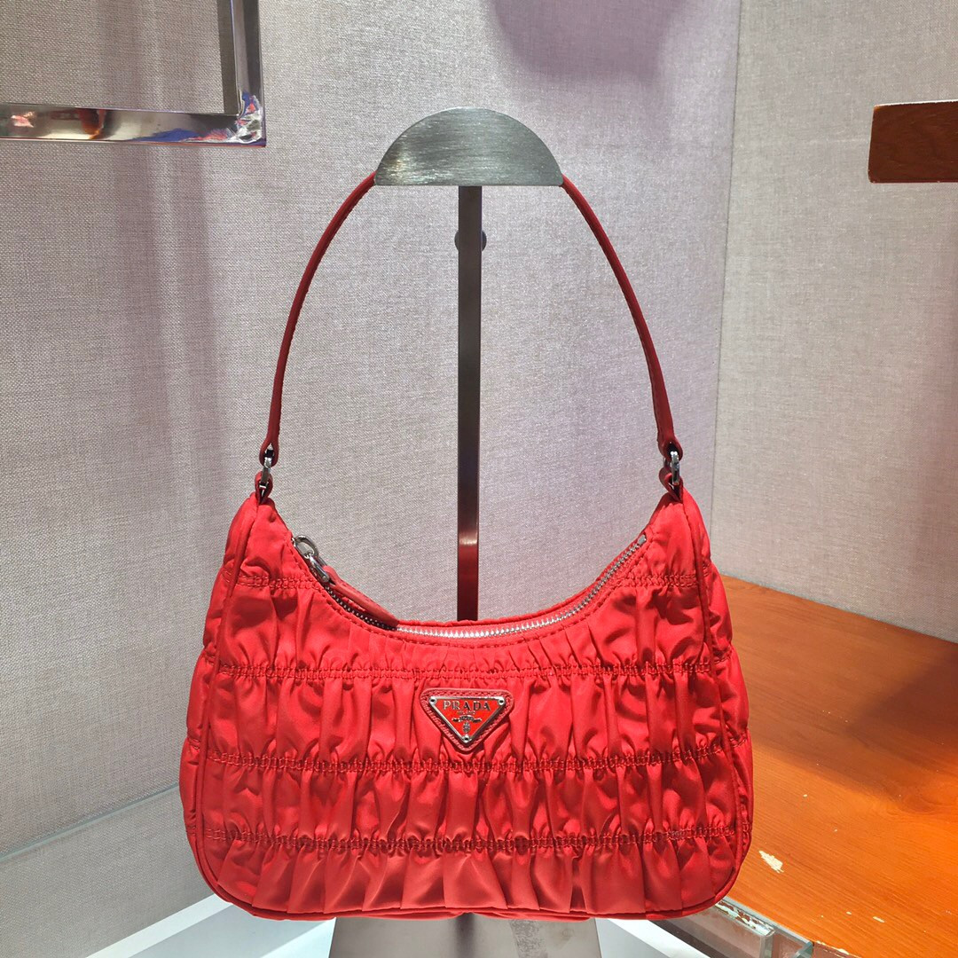 Pra*a nylon and saffiano leather mini bag