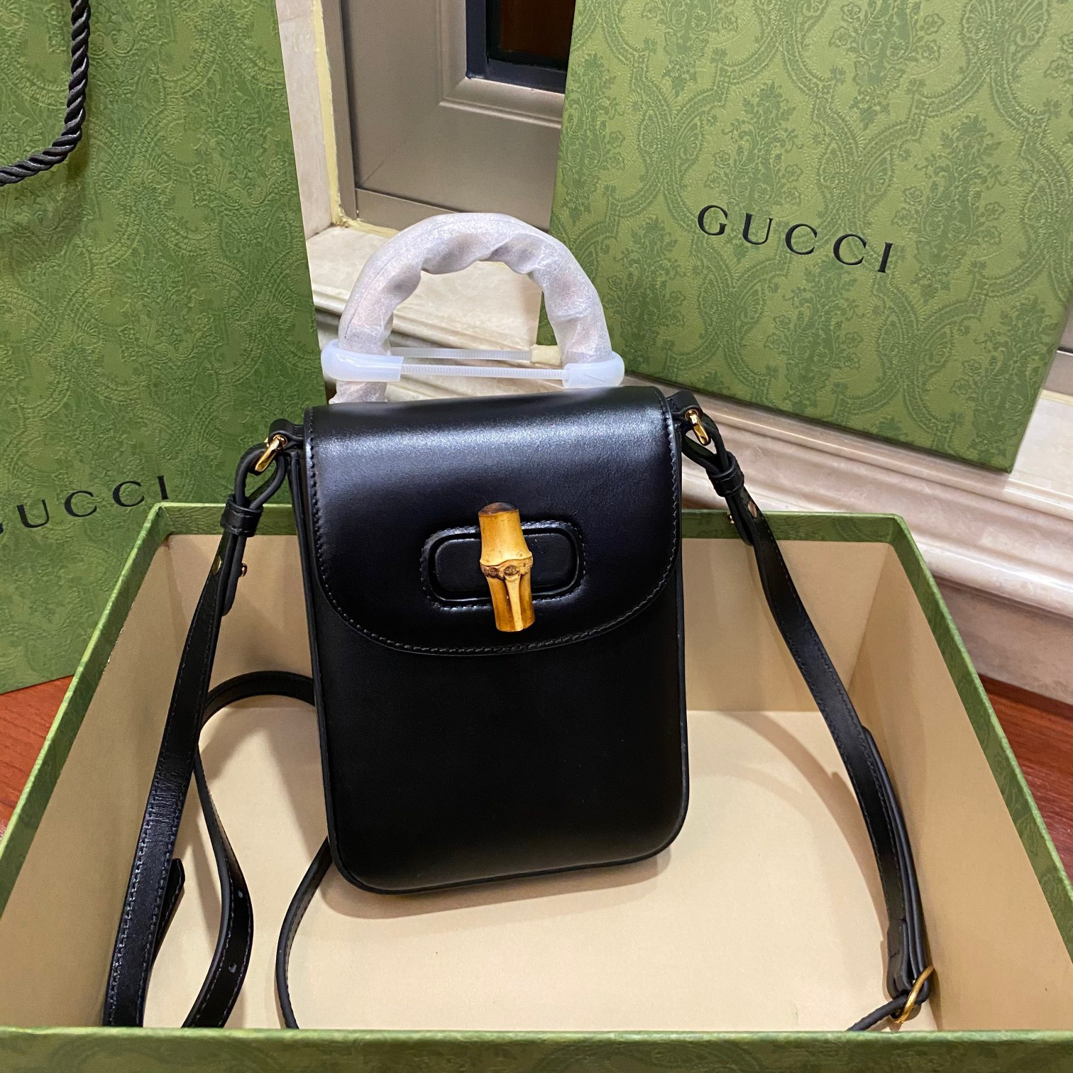 G*u*i bamboo mini handbag