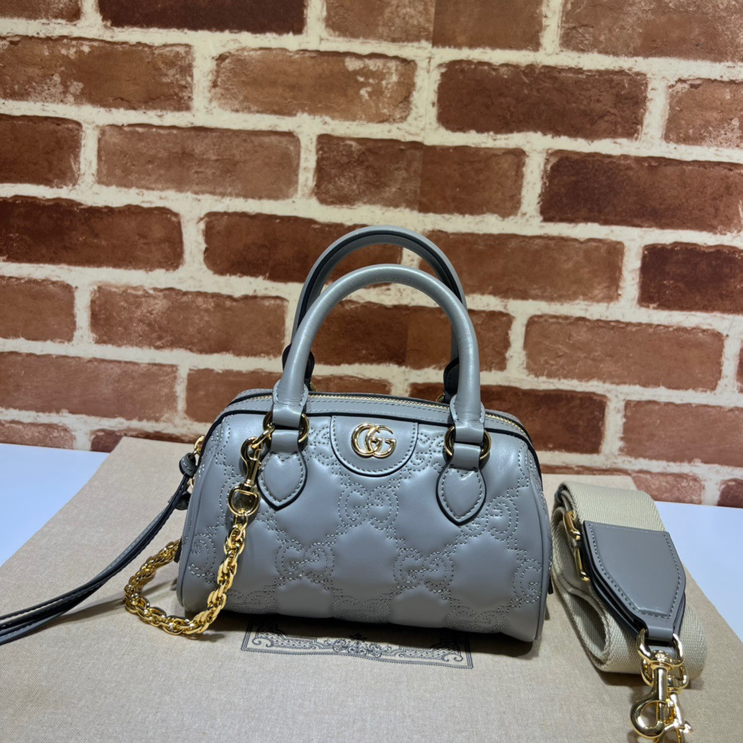 G*u*i gg matelassé leather top handle bag