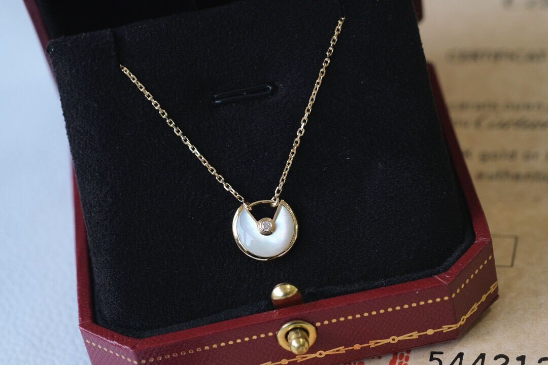 Ca*t*er  amulet necklace
