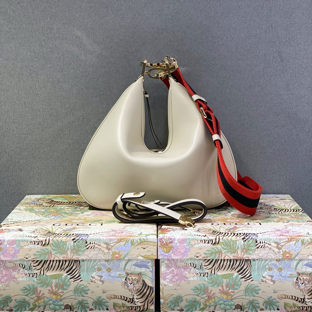 G*u*i attache large shoulder bag